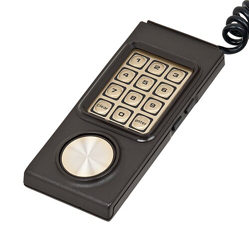 円形コントローラーと数字パッドを備えたダークブラウンのゲームパッド