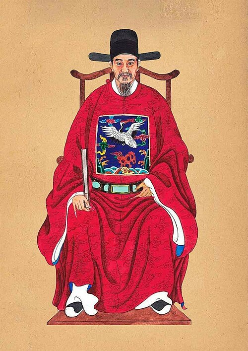 ウーシャマオの影響を受けたオ・サ・マオ帽子（mũ cánh chuồn）をかぶったベトナムのチャン・ダン・アンさん