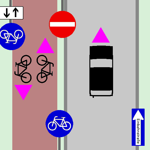 一方通行の道路で、左側に双方向通行の自転車専用レーンが1本あります。