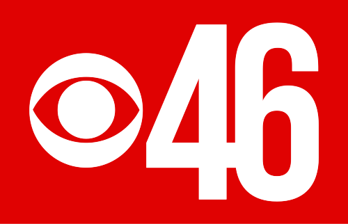 赤い長方形の上に、白い CBS の目と、その横にコンデンス サンセリフ体の白い数字 46 が描かれています。