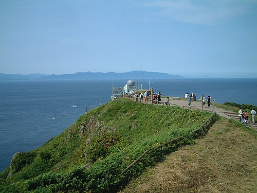 遠くに北海道を望む竜飛岬