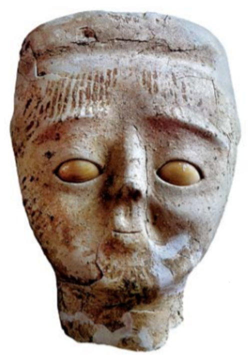 約9000年前のジェリコの彫像の頭部。エルサレムのロックフェラー考古学博物館に展示されている。