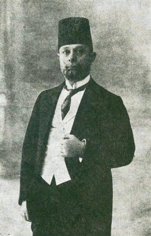 モーニングドレスにフェズ帽をかぶったトランスヨルダン首相ラシッド・タリア（1921年頃）