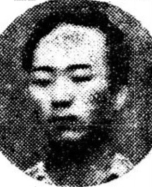 粗い白黒の顔写真 アン・ドゥヒ