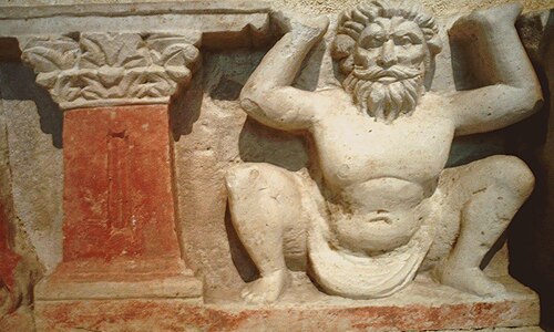 仏教の記念碑、ハッダを支えるギリシャ神アトラス