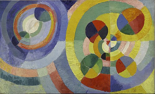 ロベール・ドローネー、1930年、「円形形態」、油彩、キャンバス、67.3 × 109.8 cm、ソロモン・R・グッゲンハイム美術館（ニューヨーク）、アンドリュー・ポウィー・フラーおよびジェラルディン・スプレッケルズ・フラー・コレクションからの寄贈、1999年