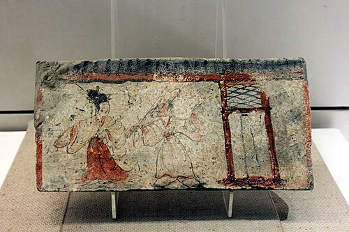 三国時代の、羅刹を着た女性と長衣を着た男性のレンガ壁画。