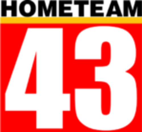 上部には太字のセリフ体文字で「HOMETEAM」と書かれ、その下に黄色のバーで区切られた赤いボックスがあり、その中に白い「43」の文字が書かれています。