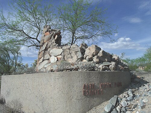 The chimney of the Rose Paulson House is the only thing that remains. The house was built in 1940 by Frank Lloyd Wright and was located on a hill by Camelback Road and Stanford Dr. The house caught fire in 1945 and what remains is the chimney that serves as part of the entrance to the Alta Vista Estates community.