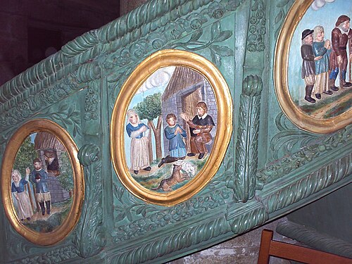 ロクロナン教区教会の多色塗装の説教壇に描かれた聖ロナンの生涯の場面。