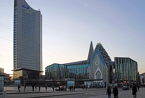 The Augusteum of the University of Leipzig with the highrise to the left