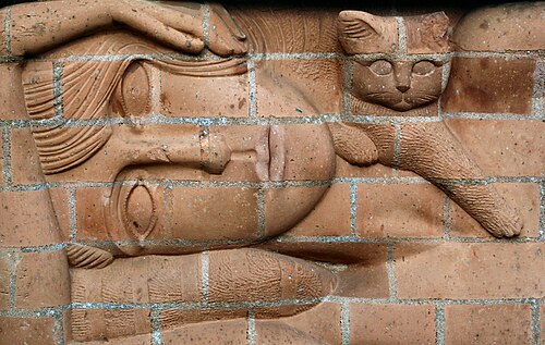 「子猫を連れた女性」の頭部のクローズアップ