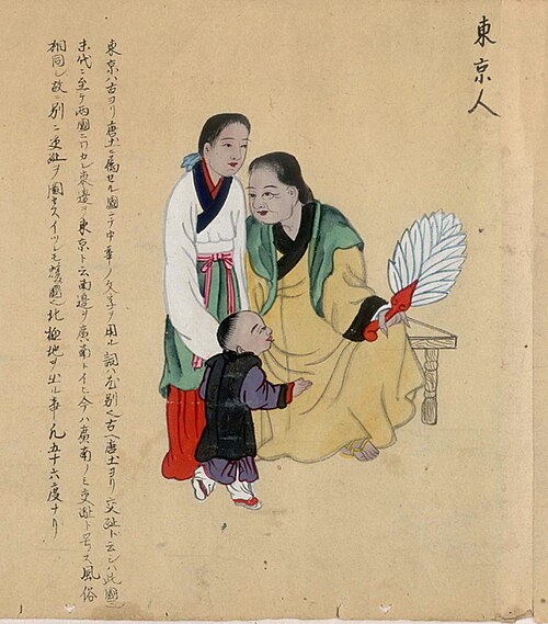 扇子を持つトンキンの女性