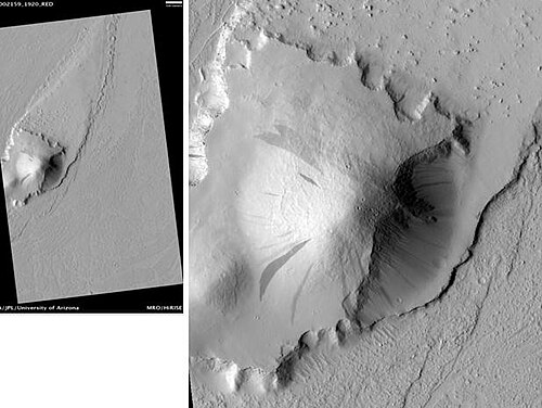 HiRISE が撮影した、マルテ渓谷の流線型の島。画像をクリックすると、暗い斜面の筋がよく見えます。島はペティット クレーターのすぐ西にあります。スケール バーの長さは 500 メートルです。