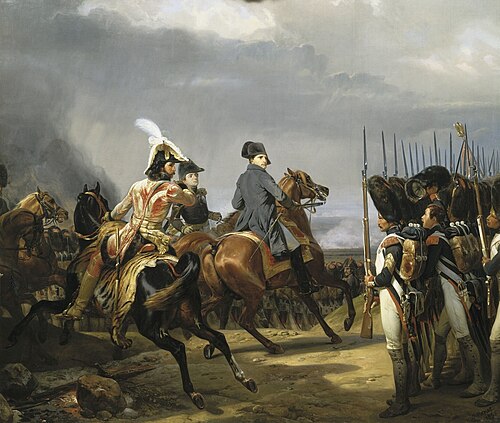 フランス皇帝ナポレオン1世が、1806年のイエナ・アウエルシュテットの戦いで近衛兵を閲兵している様子。ホレス・ヴェルネ作「イエナの戦い」。