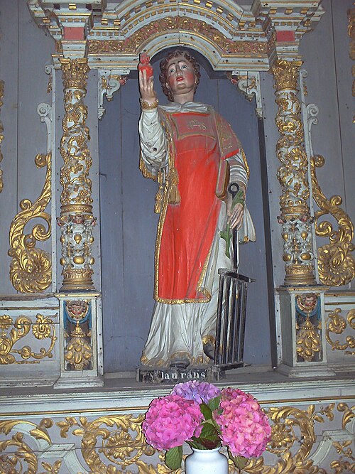 3世紀の殉教者であるローマの聖ロレンス。伝説によれば、彼は網の上で焼かれた。