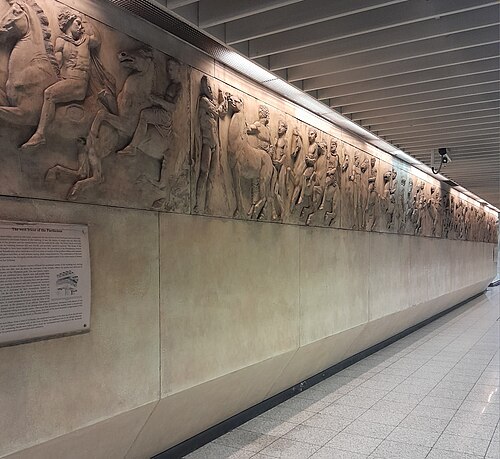 Reproduction of a part of the Parthenon's frieze, exhibited on the platforms. The original part of the frieze is exhibited at the British Museum as part of the Elgin Marbles.