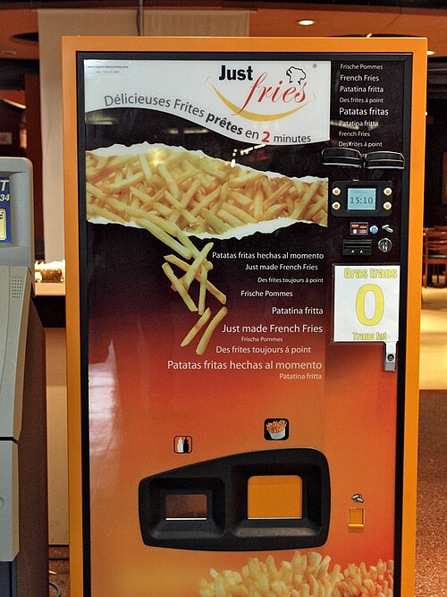 カナダのモントリオール中央駅にある Just Fries ブランドのフライドポテト自動販売機 (2009 年)