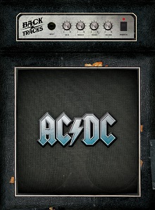 黒いアンプ、四角形。内側に「AC/DC」の文字があります。