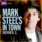 画像の左側には「Mark Steel's in Town: Series 1」という文字があり、右側には Mark Steel の写真があります。