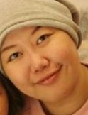 ニット帽をかぶった若い中国人女性。