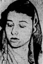 下を向き右を向いている黒髪の女性の新聞写真。